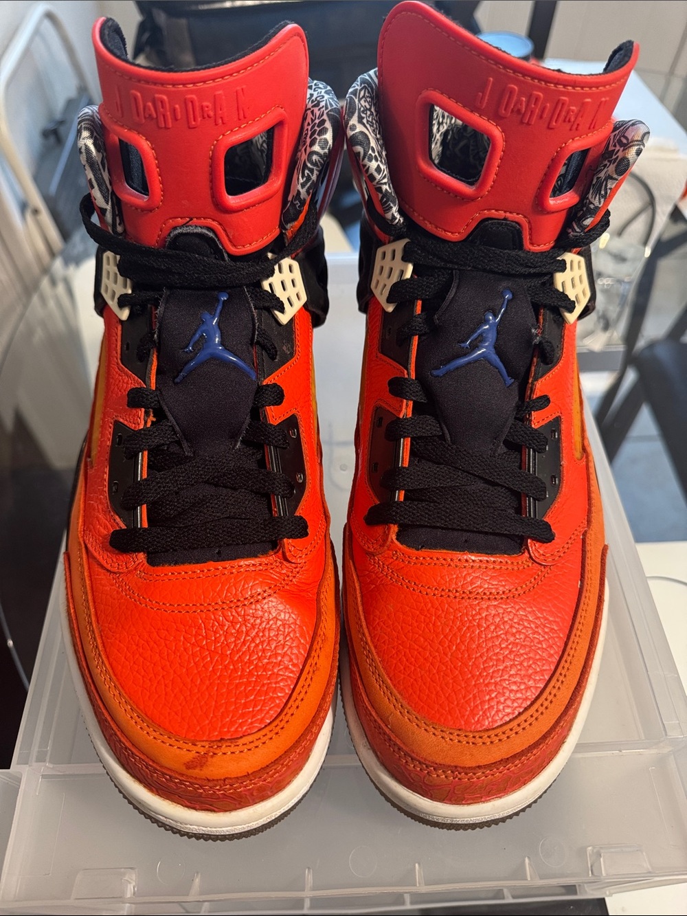 Jordan Orange and Black High-Top Sneakers with Blue Jumpman